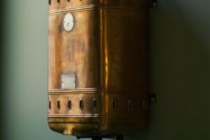 brown steel container on white wall